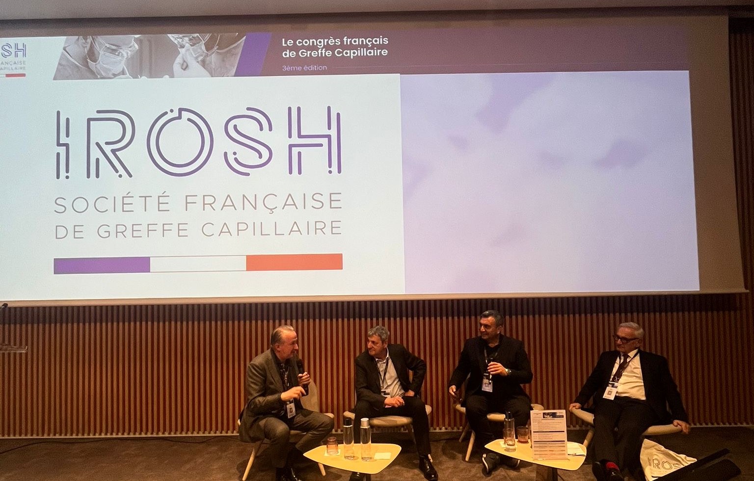 Dr. Arslan Musbeh speaking at IROSH 2024, Paris