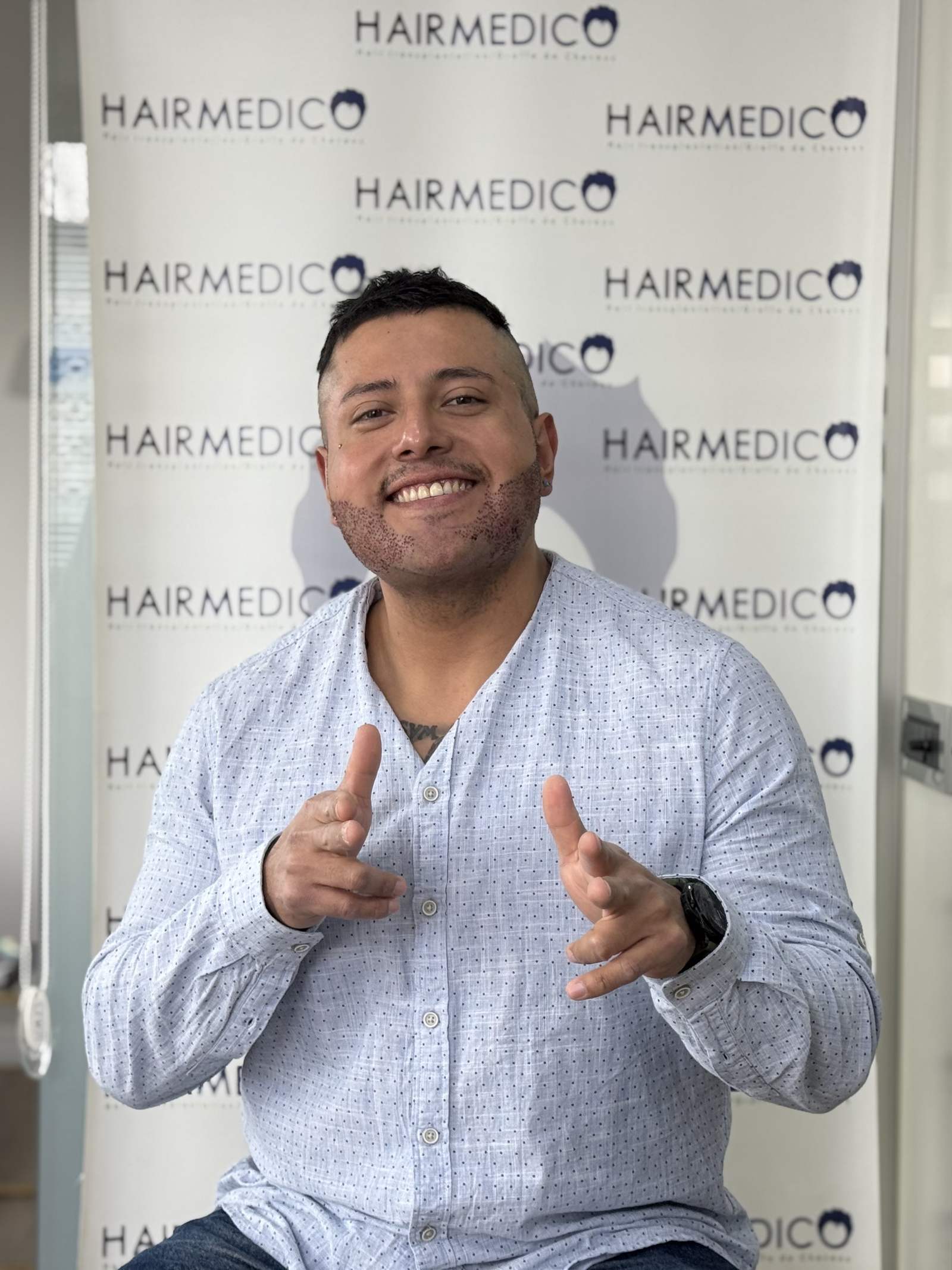 Hairmedico beard transplant patient celebrating his result on procedure day
