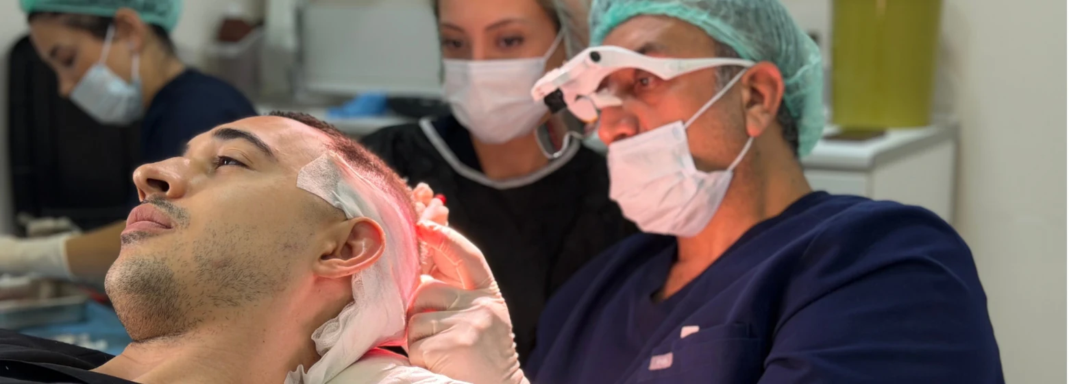Hairmedico's surgical team performing a DHI implantation session in Istanbul
